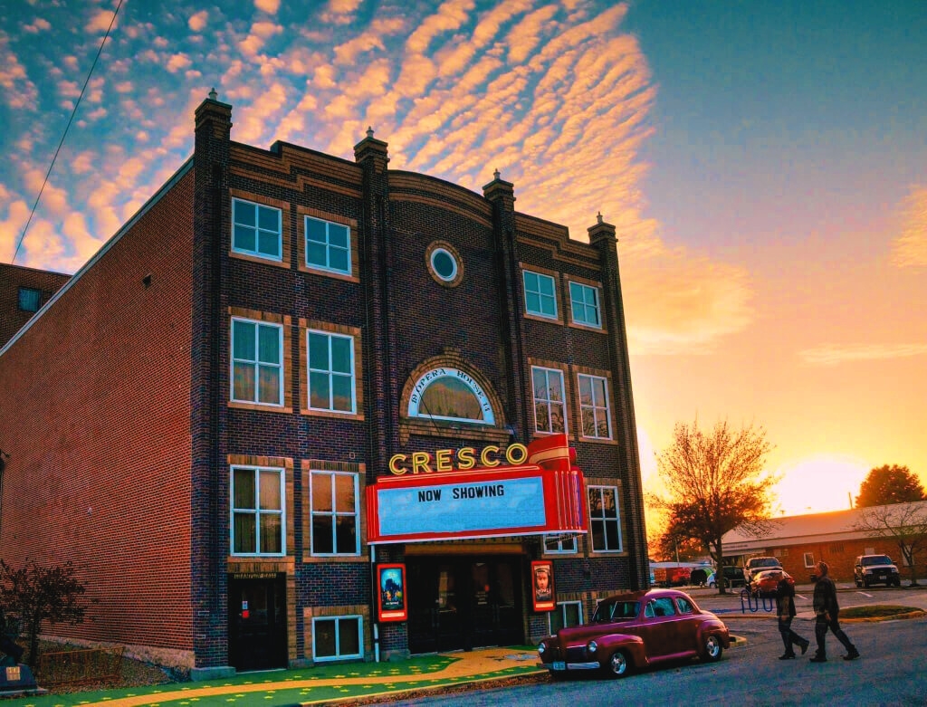 Historic Cresco Theatre & Opera House, built in 1914, features a prominent sign.