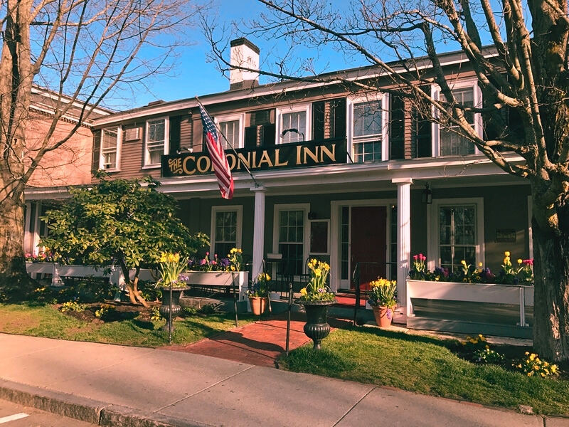 The Colonial Inn, built before the Revolutionary War, is steeped in history, including witnessing the first battle at Lexington and Concord. It is also renowned as one of the most haunted places in Massachusetts, with a reputation for paranormal activity.