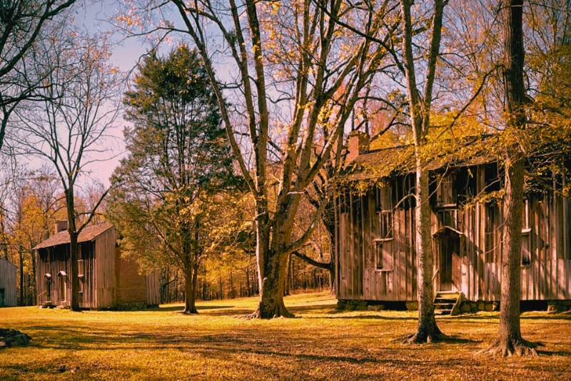 An image capturing the old mill at the Stagville Plantation, reflecting its historical significance and scenic beauty.