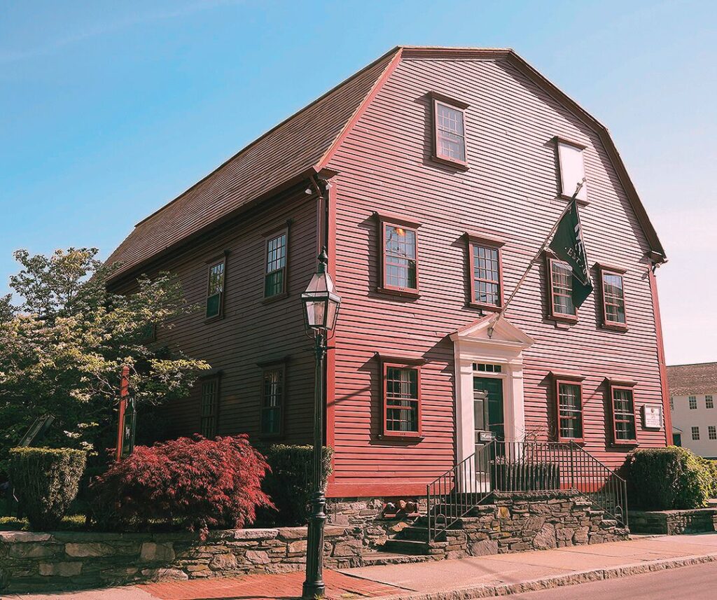 Red building of the White Horse Tavern, an infamous site in Rhode Island.